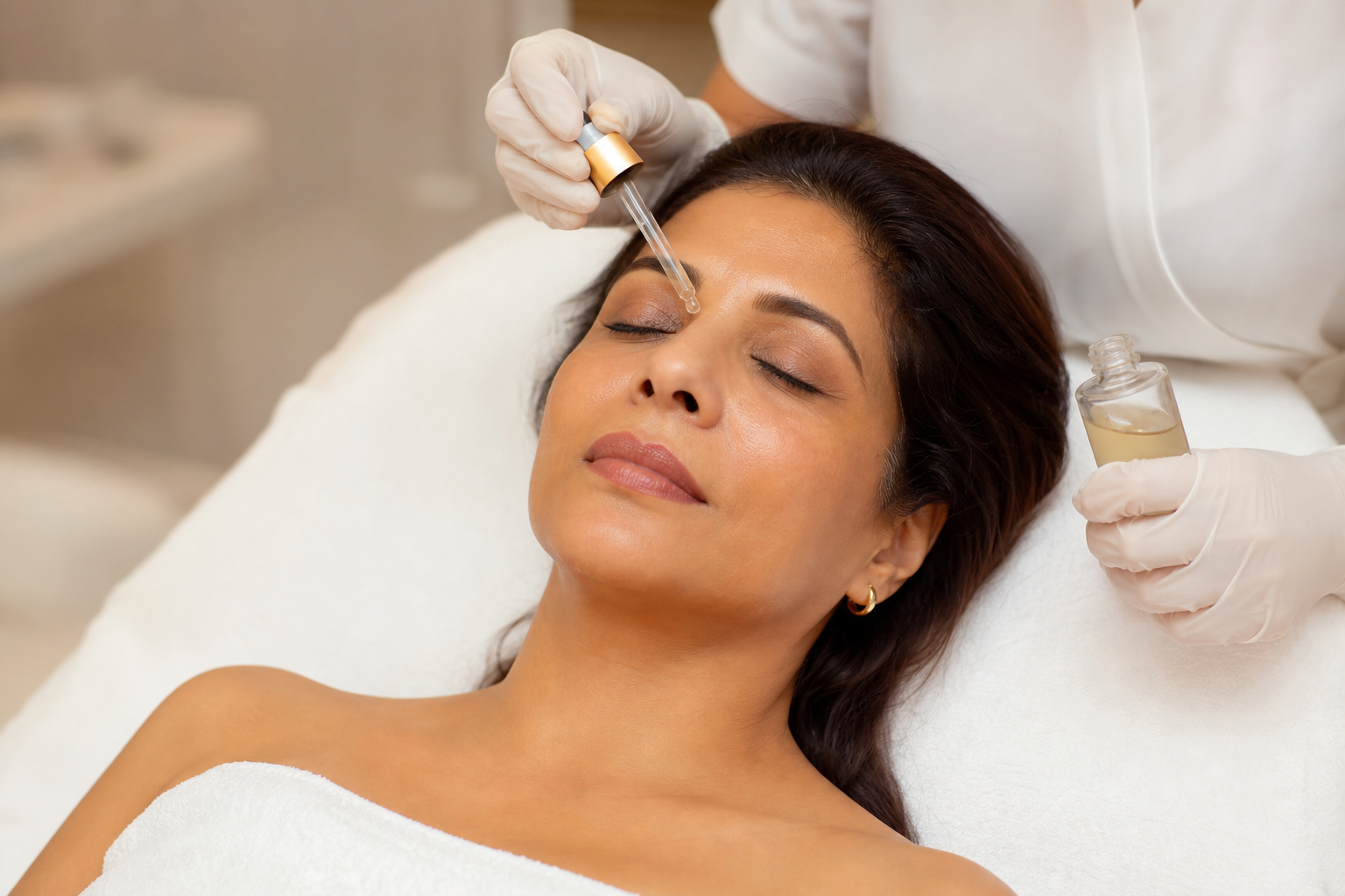 Indian woman receiving anti-aging treatment at Wiora Wellness