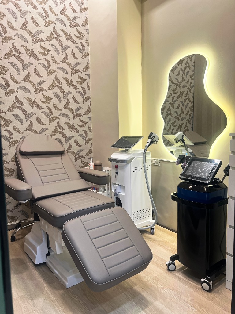 Treatment suite at Wiora Wellness with aesthetic equipment and illuminated mirror